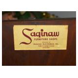 THE SIGNATURE LABEL INSIDE THE PULL-OUT TABLE CABINET