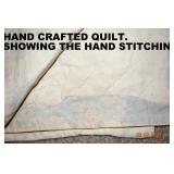 CLOSE VIEW OF BACK SIDE SHOWING HAND STITCHING