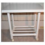 ANOTHER LEISURE WORLD PVC OUTDOOR FURNITURE PIECE. ROLLING SERVE CART OR TABLE