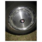 HAS ALL 4 ORIGINAL HUB CAPS