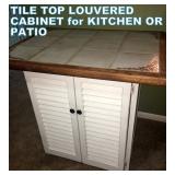 CUSTOM CRAFTED TILE-TOP, LOUVERED SIDES CABINET