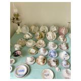 TABLE FULL OF CUP AND SAUCER TREASURES