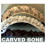 MORE CARVED BONE. LOOKS LIKE IVORY