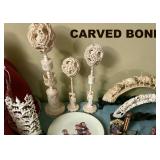 ANOTHER VIEW OF THE HAND CARVED BONE ITEMS, DISPLAYED PROPERLY