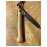 CLOSER VIEW OF THE KNIFE