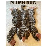 A GENUINE FAUX LEOPARD SKIN PLUSH RUG