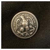 CLOSEUP OF A BUTTON ON THE PEA COAT
