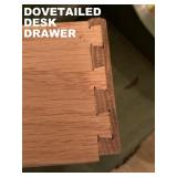 CLOSEUP OF DOVETAILED DRAWER JOINT. QUALITY!