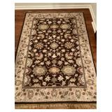 ONE OF THE MULTIPLE AREA RUGS AND/OR THROW RUGS