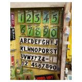 HOUSE AND SIGN LETTERS