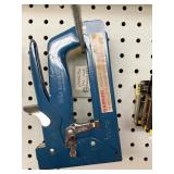 STAPLE GUN. ALSO MANY BOXES OF STAPLES