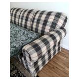 CLOSEUP OF THE PATTERN OF THE SOFA