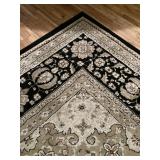CORNER VIEW OF THE RUG PATTERN