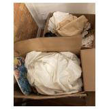 BOXES FULL OF BED LINENS