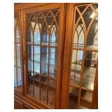 LOTS OF DISPLAY ABOVE IN LIGHTED CABINET WITH GLASS SHELVES