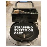 CARGO STRAPPING SYSTEM MOUNTED ON PORTABLE CART