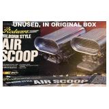 THE BOX CONTAINING THE AIR SCOOP