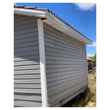 VINYL SIDING AND THE ROOF TILES ENDURED THE RECENT HURRICANE