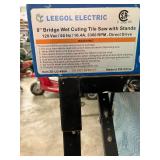 ELECTRIC TILE SAW ON WORK TABLE