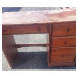 Wooden desk has 4 drawers 30 X 45 X 24