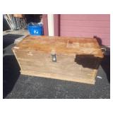 wooden trunk has wicker handles, has a tray - top is locked but opens up as part is disconected 18x3