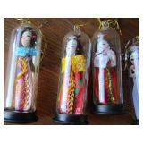 JAPANESE DOLLS IN GLASS TUBES  