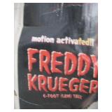Freddy Kruger 6ft tall motion activated yard décor new in original box, box has some damages
