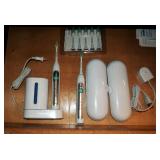 Phillips Sonic Care Tooth Brushes, New Replacement Brush Heads And Travel Cases