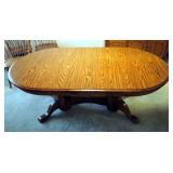Oak Pedestal Dining Room Table With Two Leaves, 29"H x 75"L x 42"W, Leaves 12"