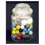 Marbles In Glass Canister