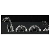 Baccarat Crystal Lock Ness Monster, Four Pieces
