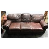 Brown Leather Couch With Brass Tack Accents, 36"H x 88"L x 42"D