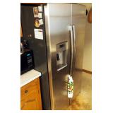 General Electric Side By Side Refrigerator With Stainless Finish, Water And Ice in Door, Model # PSE