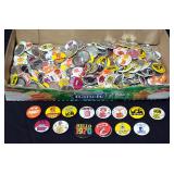 Assortment Of Collegiate Fan And Promotional Buttons Including Nebraska, Iowa, Auburn, Arizona, Vand