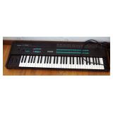 Yamaha Digital Programmable Algorithm Synthesizer With CD Tower With Holiday CD