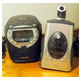 Phillips Compact Disk Clock Radio And Projection Alarm Clock Radio