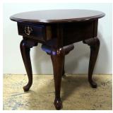 Kincaid Solid Wood Oval End Table With Single Drawer, Brass Pull, 23.5"H x 27.5"W x 23.5"D