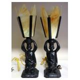 Pair Of Table Lamps With Woman Holding Lamp Above Her Head, Metal Base, Colored Glass Shades, Powers
