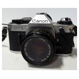 Canon Ae-1 Program Camera With Cannon 1:1.8 50mm Lense Sunpak Flash, Vivitar Flash, Telephoto Lense 