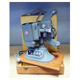 Vintage DeJur Model 750 Reel To Reel Projector, Includes 2 Reels And Lubricating Oil, In Self Contai