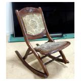 Unique Folding Rocking Chair With Needlepoint Back And Seat And Carved Rose In Headrest, Some Stains