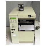 Zebra 105SL Label Printer, Powers On, Includes Ribbon Roll