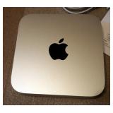Apple Mac Mini PC Model # A1347 And Bluetooth Mouse Pad Model # A1339 With Spec Sheet