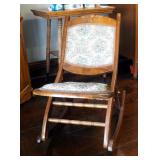 Antique Folding Rocking Chair With Carved Rose Back And Needlepoint Seat