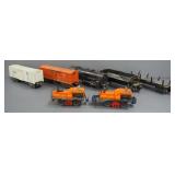 Train Car Assortment, Includes Lionel Dump Car, Unmarked Engine, Box Car, Lionel Logger, And More