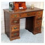 Solid Wood Nine Drawer Desk With Carved Ribbon Edge, 30in x 42in x 21in
