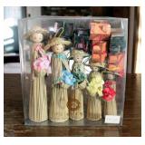 Asian Ceramics, Reed Dolls, Abacus, And Travel Guides