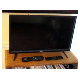 Vizio 24" Television, Model D24HN-G9, With Rabbit Ear Antenna, And Remote