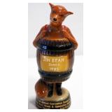 Norcrest Skull And Crossbone Decanter #J-381, Jim Beam Convention Figurine,  And Six Eyed Guy Decant