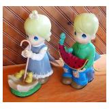 Precious Moments Figurines, Qty 2, Girl With Umbrella, And Boy Eating Watermelon, 10" Tall
